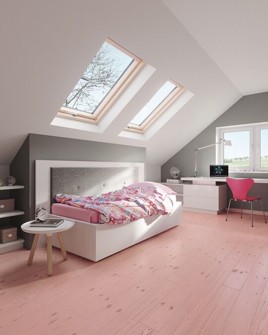 Osmo solid wood flooring treated with Osmo Wood Wax Finish in a bespoke colour in bedroom